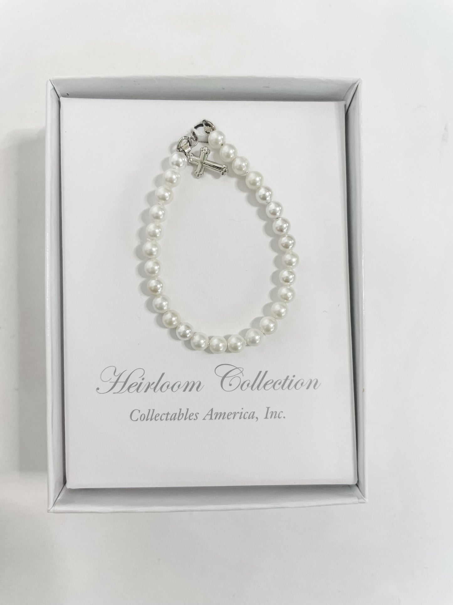 Pearl Bracelet with Silver Cross